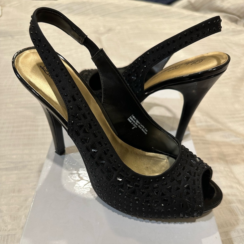 Black slingback open toe heels